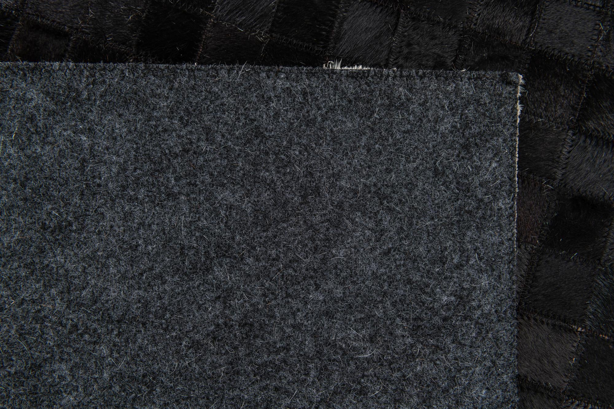 5' 1 x 8' Cowhide Stocks Rug