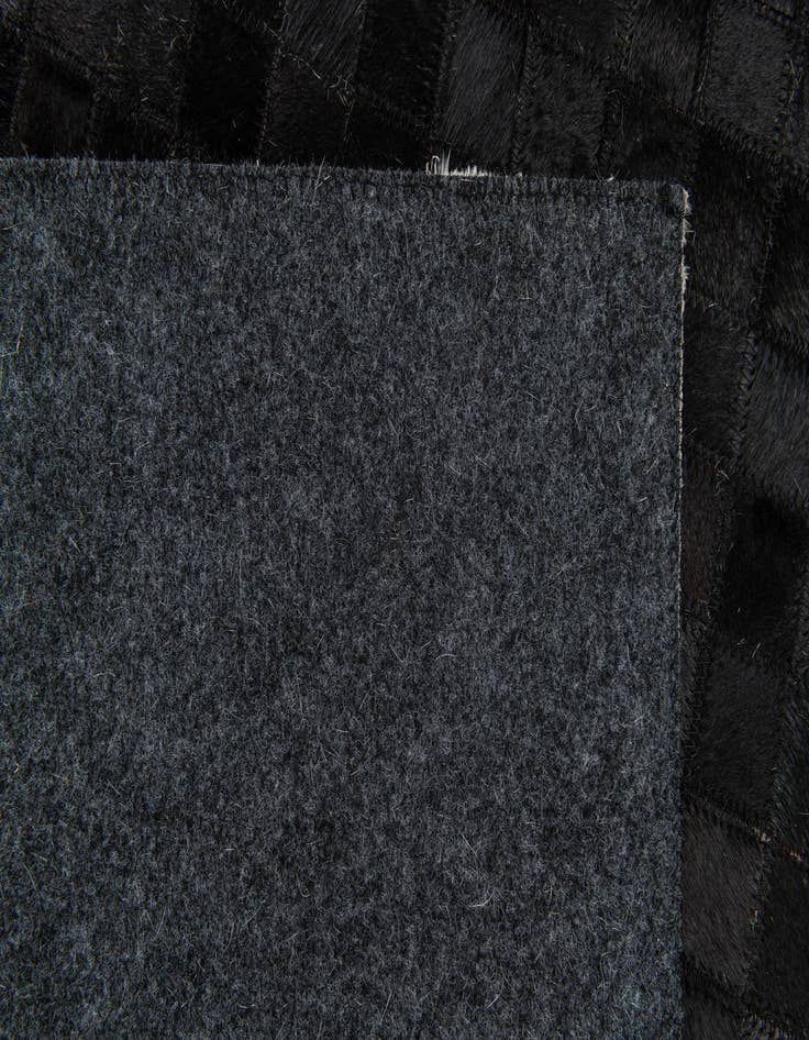 Detail image of 5' 1 x 8' Cowhide Stocks Rug