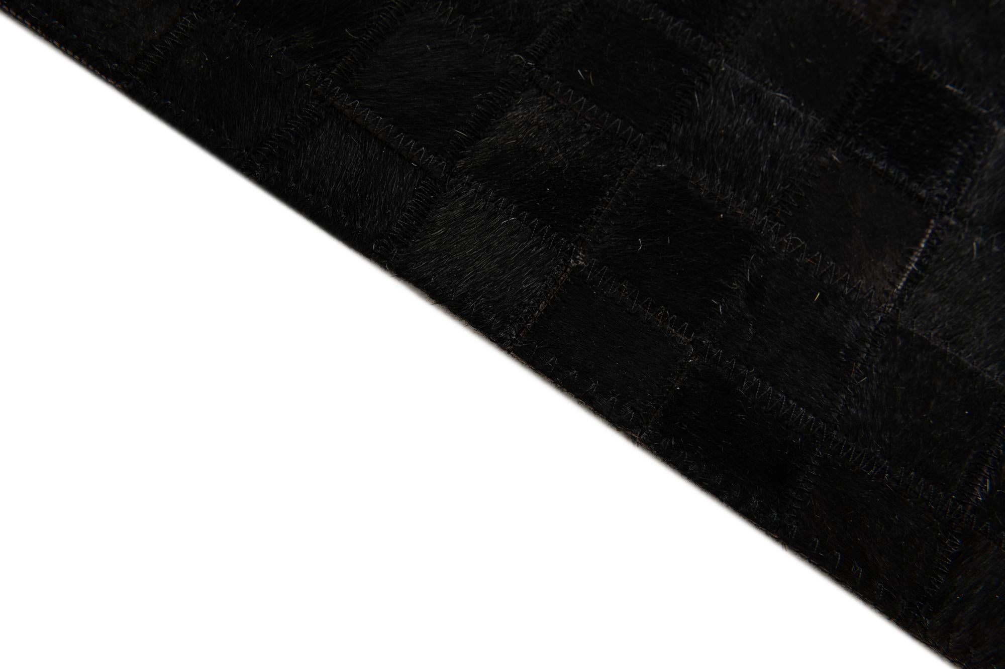 5' 2 x 8' Cowhide Stocks Rug