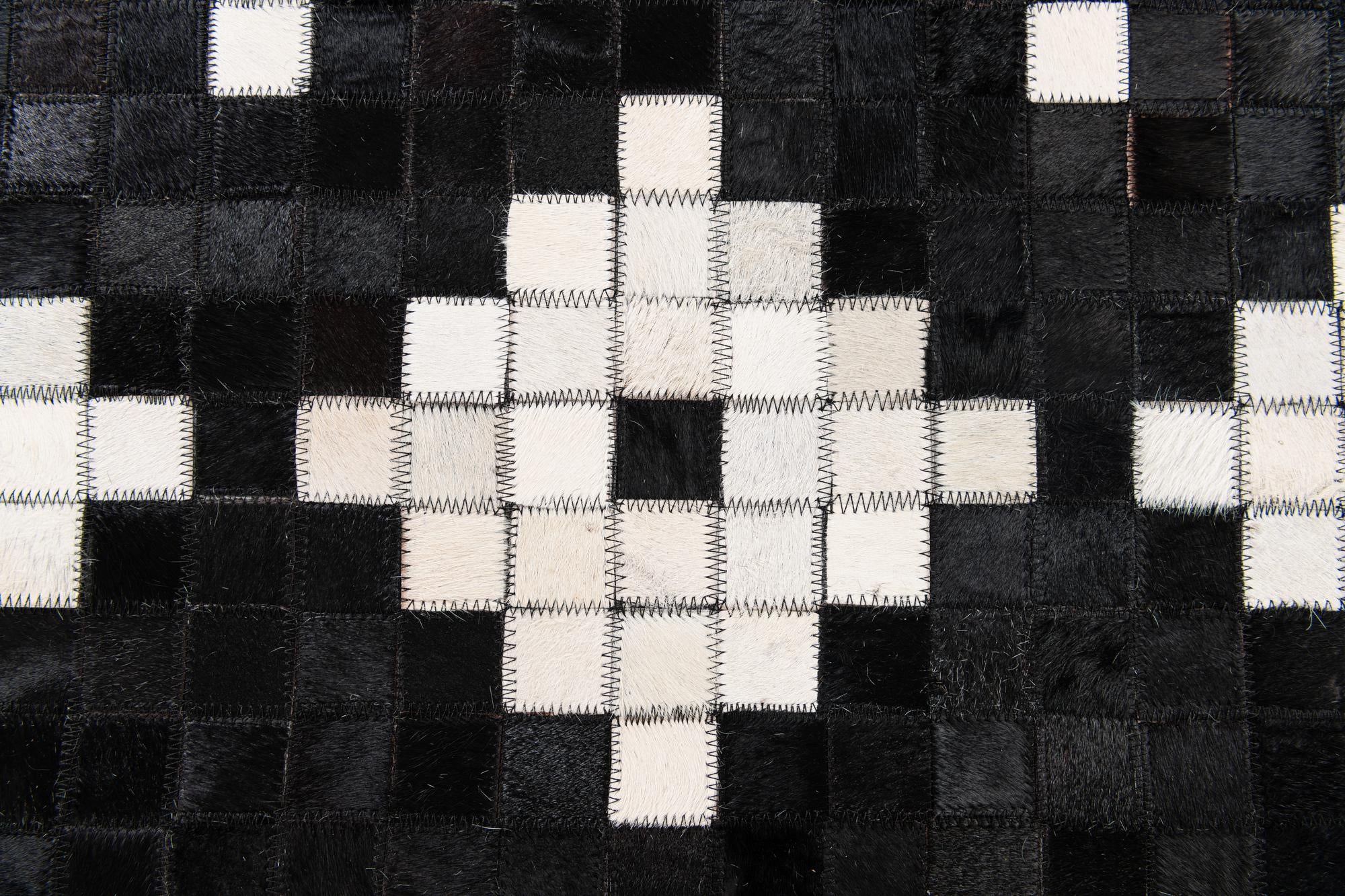 5' 2 x 8' Cowhide Stocks Rug