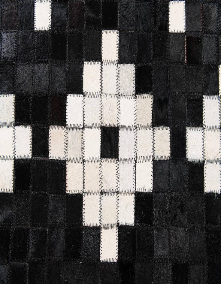 Detail image of 5' 2 x 8' Cowhide Stocks Rug