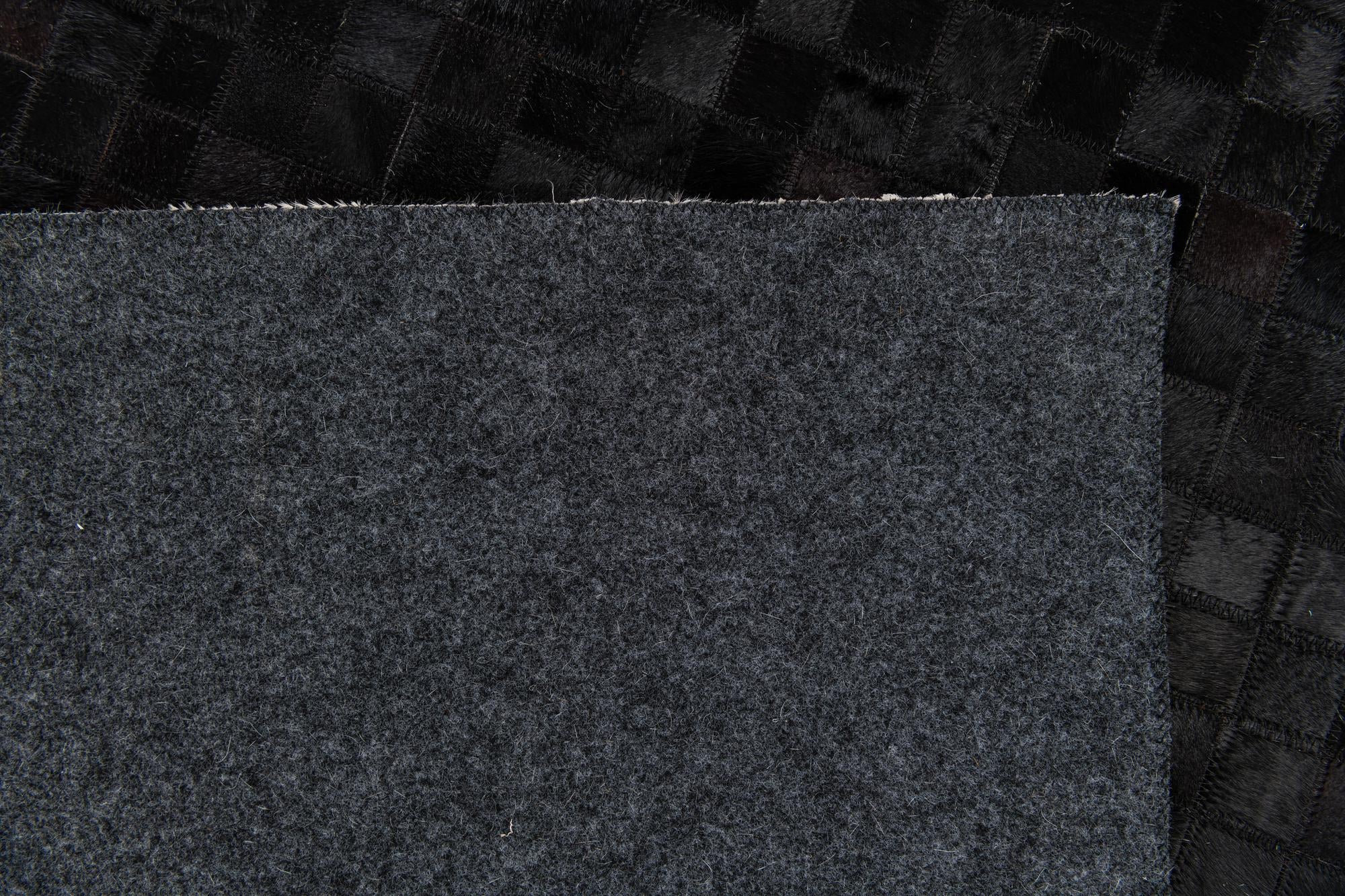 5' 2 x 8' Cowhide Stocks Rug