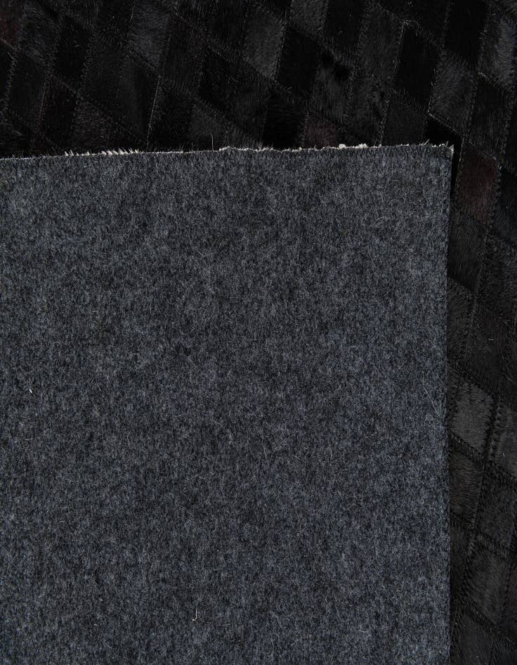 Detail image of 5' 2 x 8' Cowhide Stocks Rug