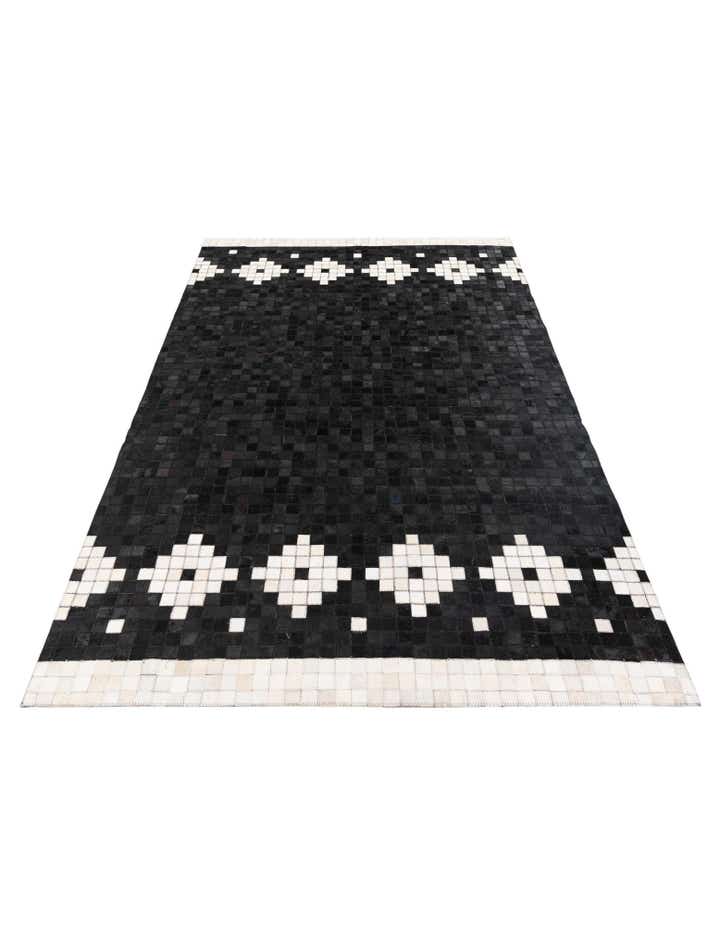 5' 2 x 8' 1 Cowhide Stocks Rug