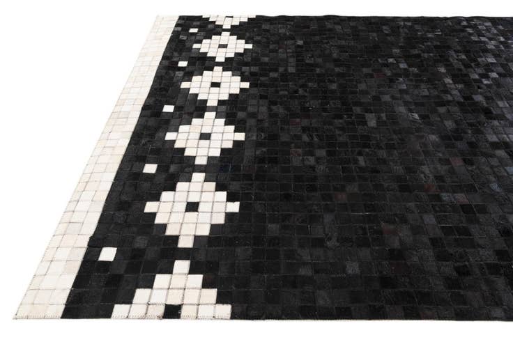 Detail image of 5' 2 x 8' 1 Cowhide Stocks Rug