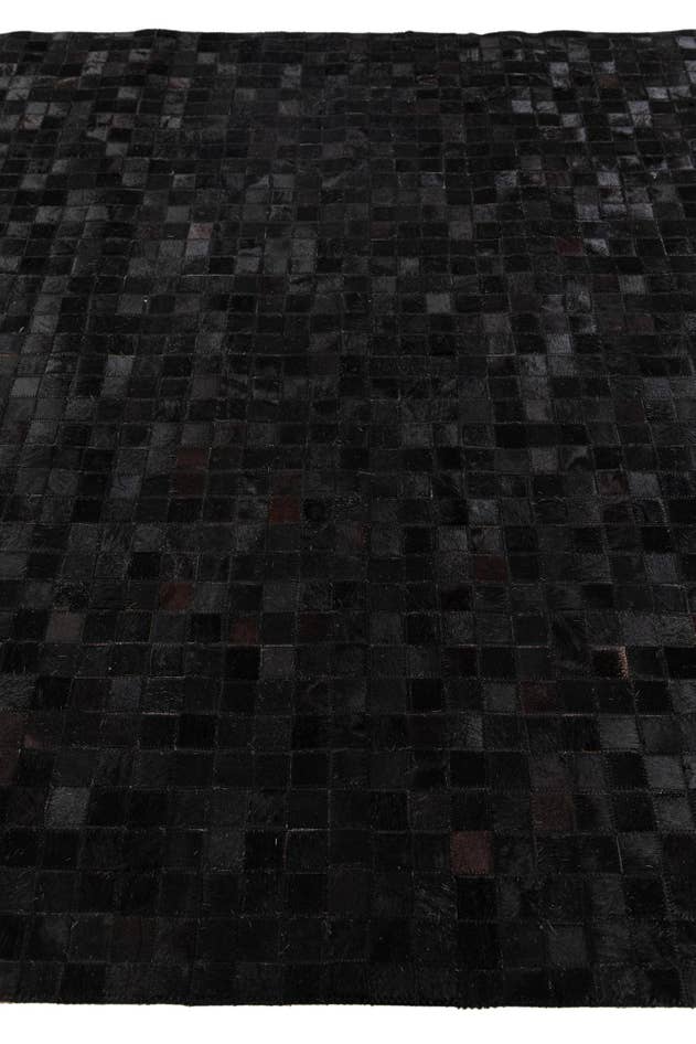 Detail image of 5' 2 x 8' 1 Cowhide Stocks Rug