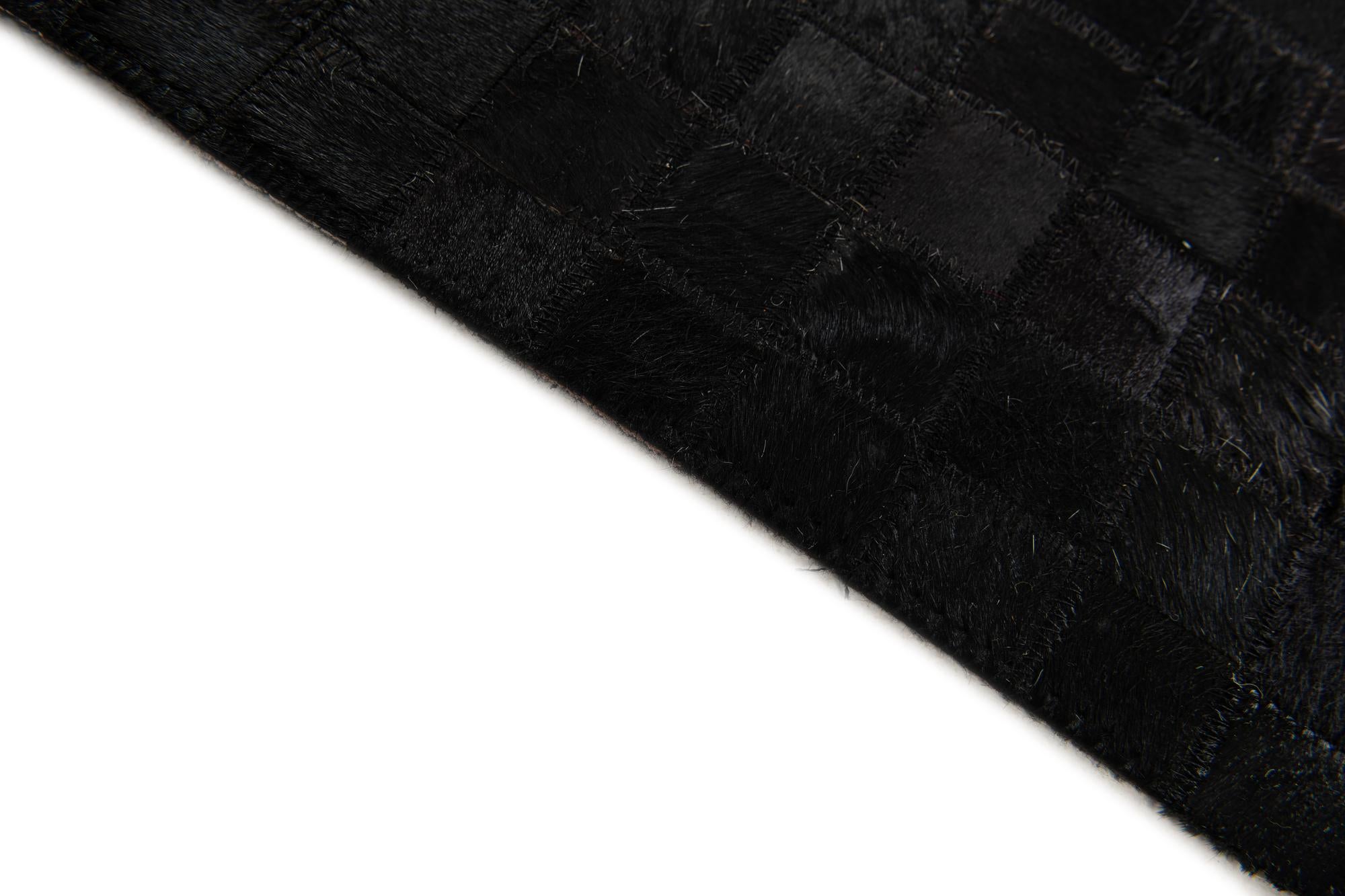 5' 2 x 8' 1 Cowhide Stocks Rug