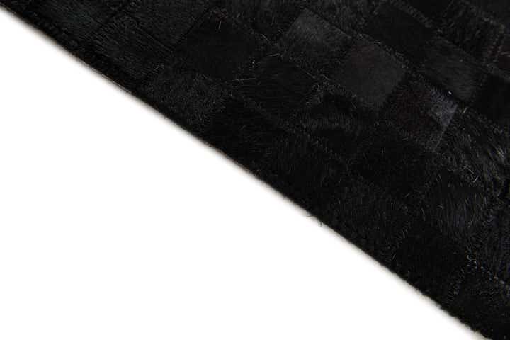 5' 2 x 8' 1 Cowhide Stocks Rug