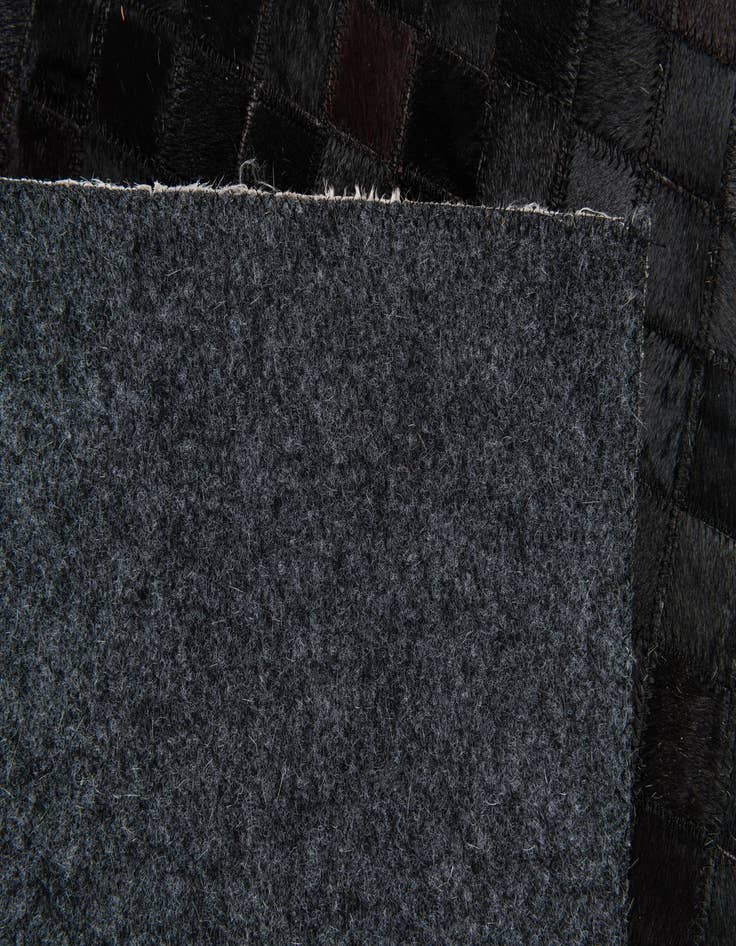 Detail image of 5' 2 x 8' 1 Cowhide Stocks Rug