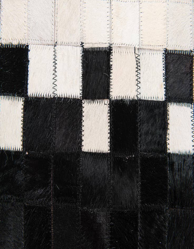 Detail image of 5' 2 x 8' Cowhide Stocks Rug