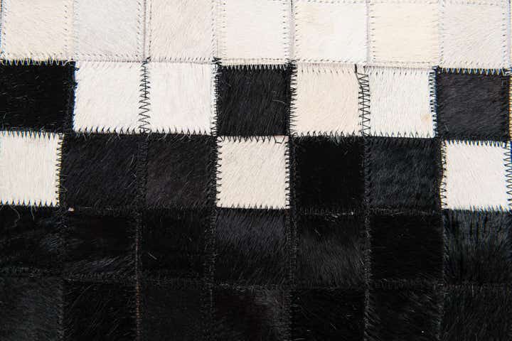 5' 2 x 8' Cowhide Stocks Rug
