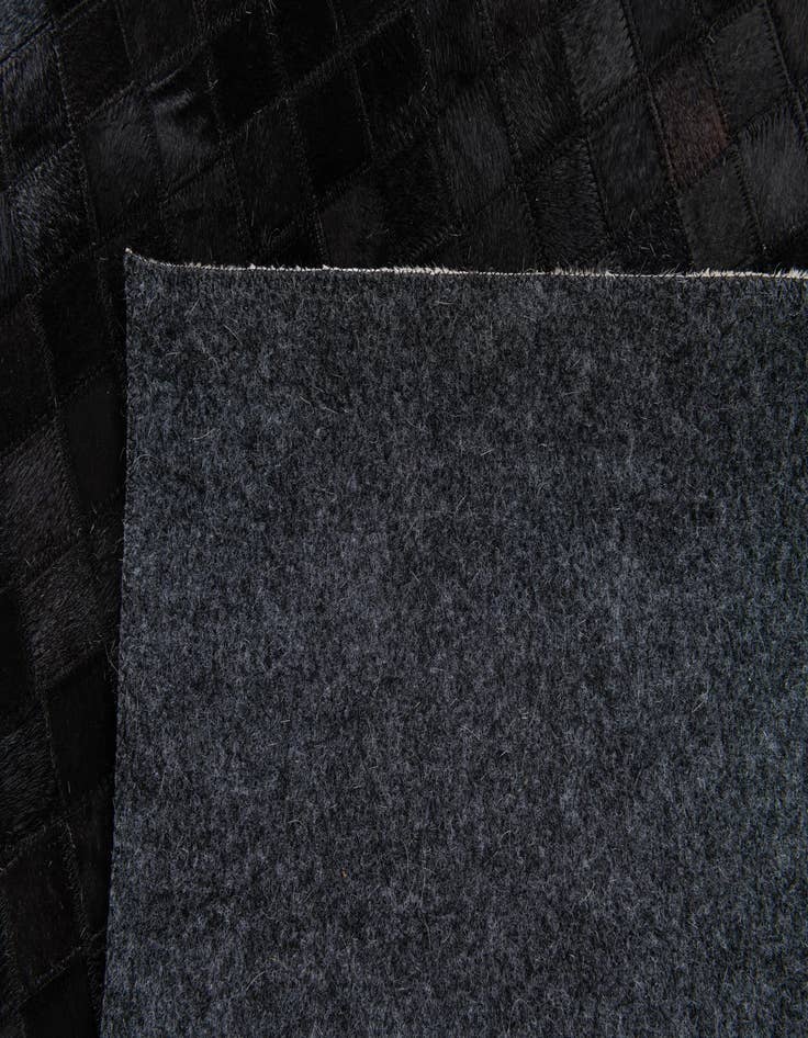 Detail image of 5' 2 x 8' Cowhide Stocks Rug