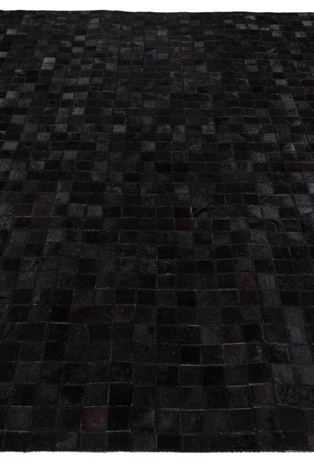 Detail image of 5' x 7' 11 Cowhide Stocks Rug