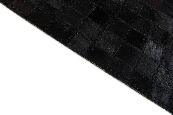 Detail image of 5' x 7' 11 Cowhide Stocks Rug