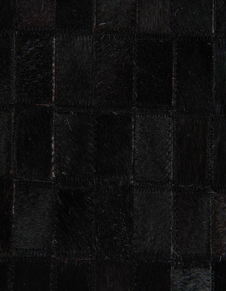 Detail image of 5' x 7' 11 Cowhide Stocks Rug