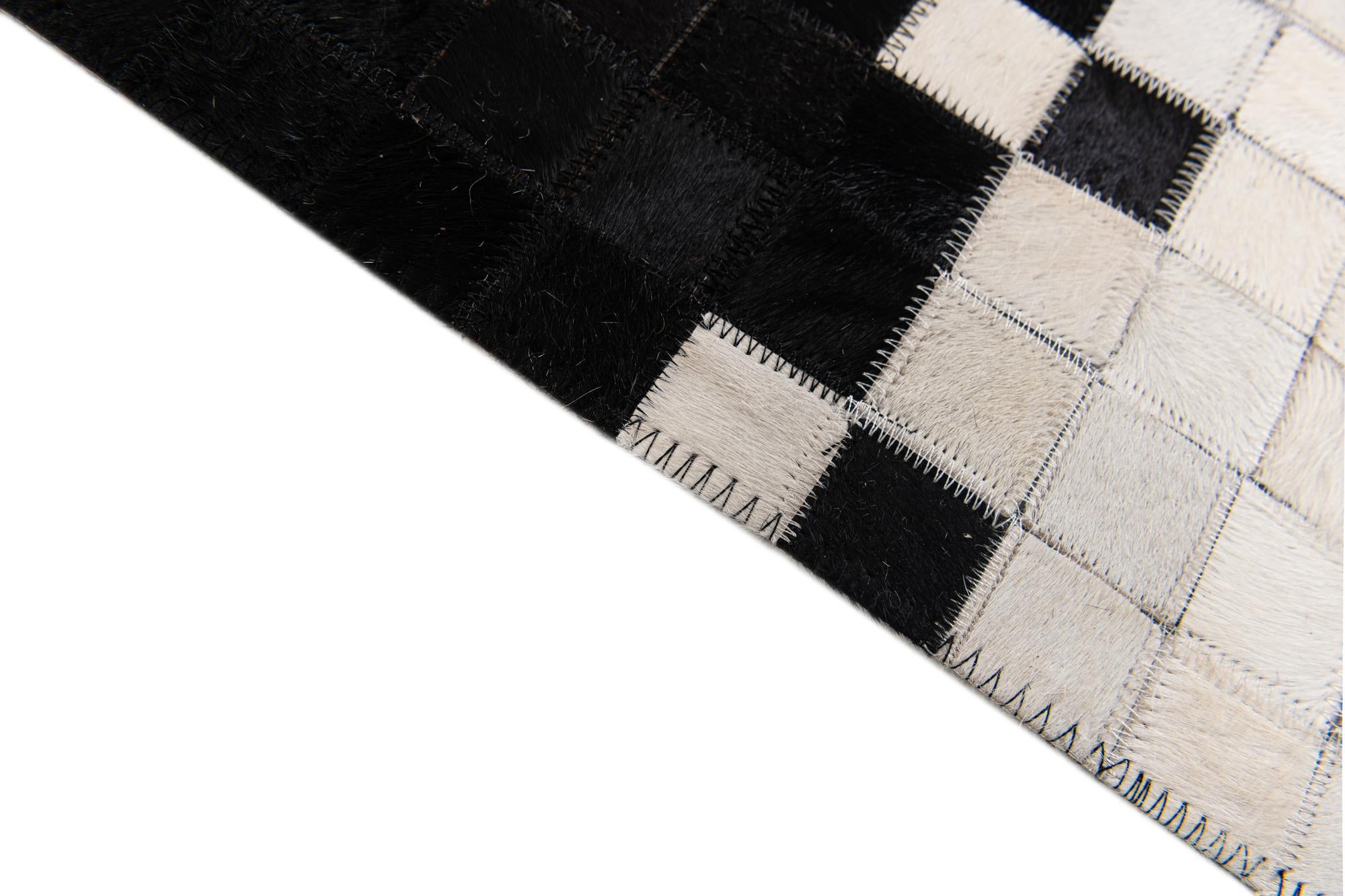 5' x 8' Cowhide Stocks Rug