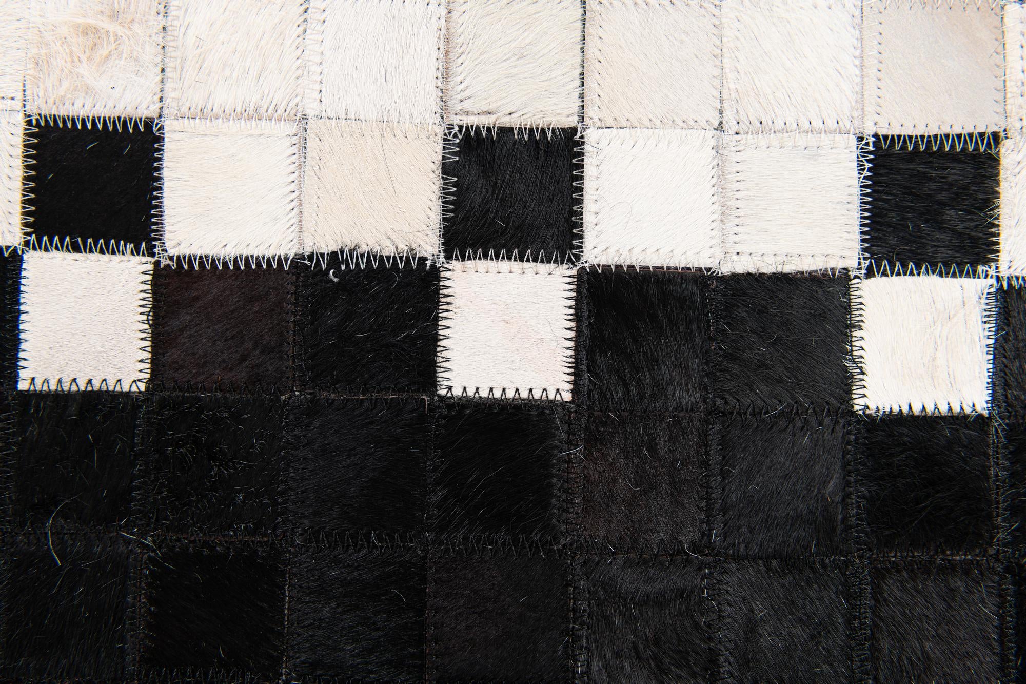 5' x 8' Cowhide Stocks Rug