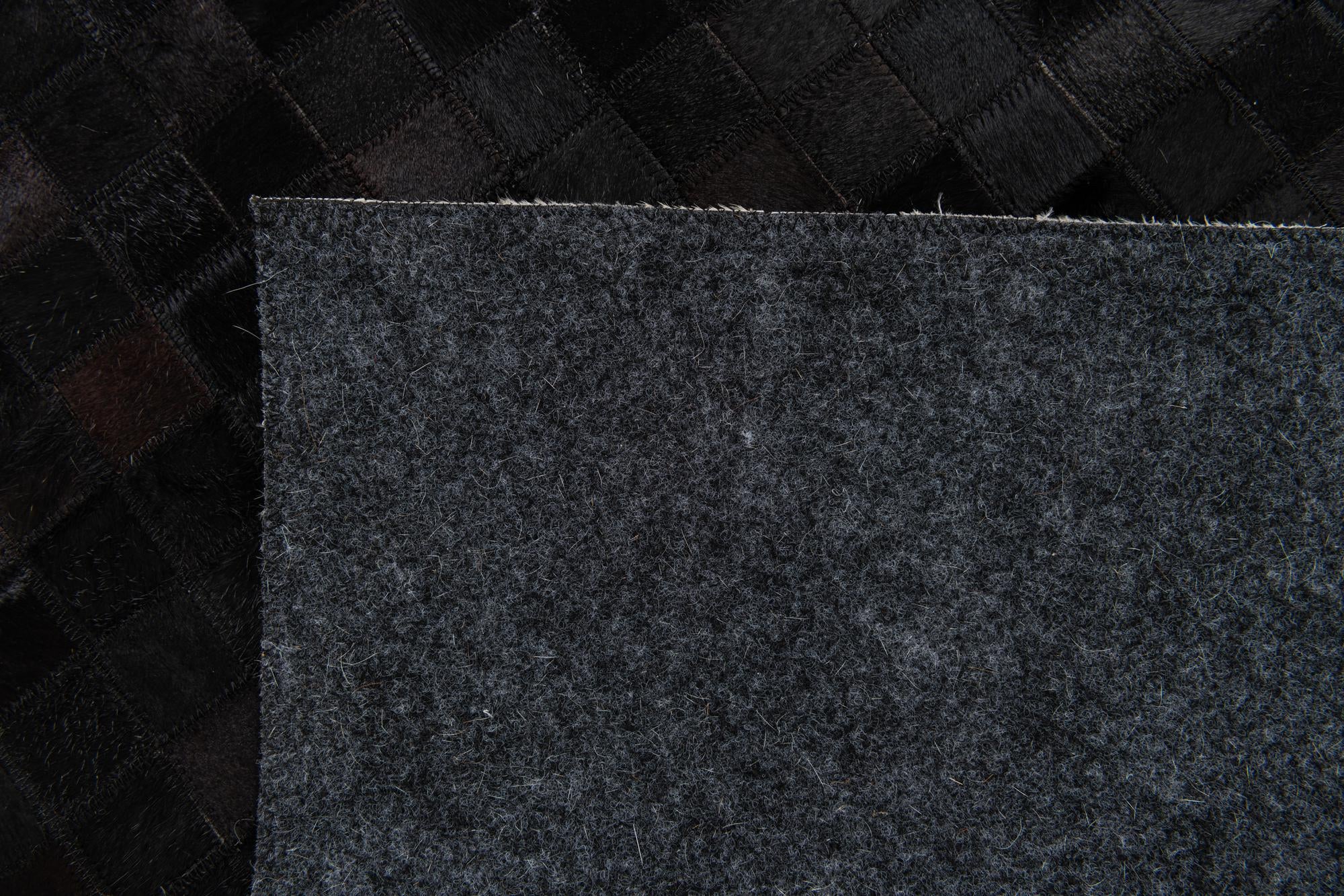5' x 8' Cowhide Stocks Rug