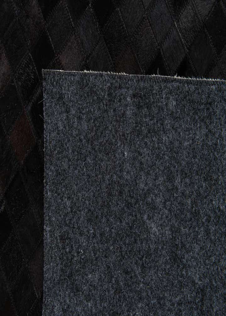 5' x 8' Cowhide Stocks Rug