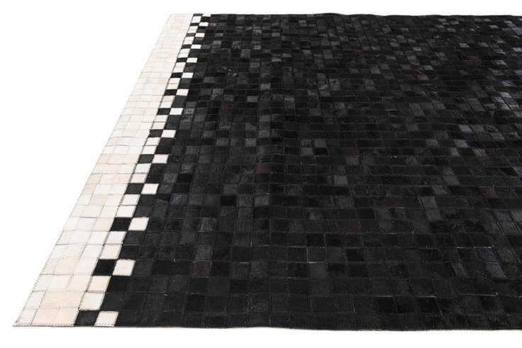 Detail image of 5' 1 x 8' 1 Cowhide Stocks Rug