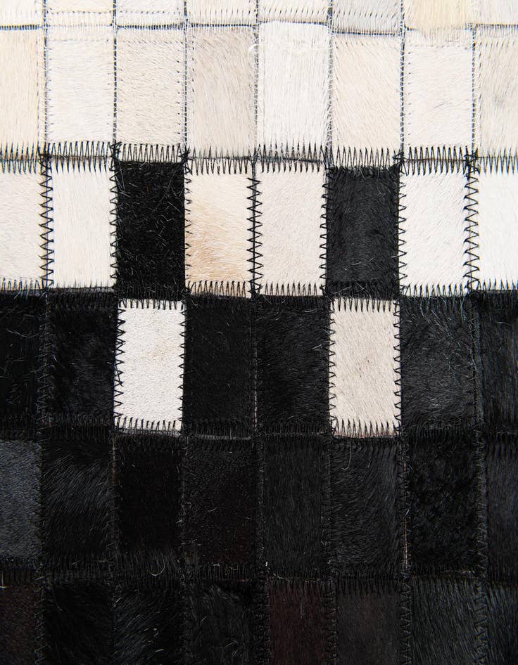 Detail image of 5' 1 x 8' 1 Cowhide Stocks Rug