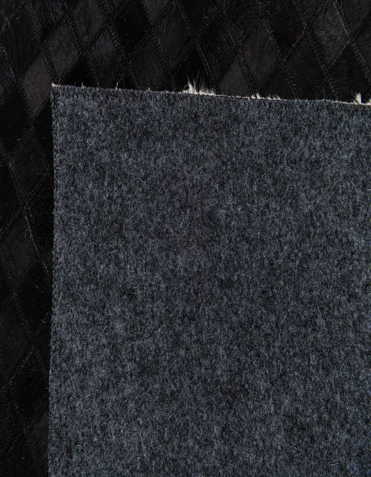 Detail image of 5' 1 x 8' 1 Cowhide Stocks Rug