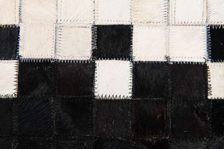 5' x 8' Cowhide Stocks Rug
