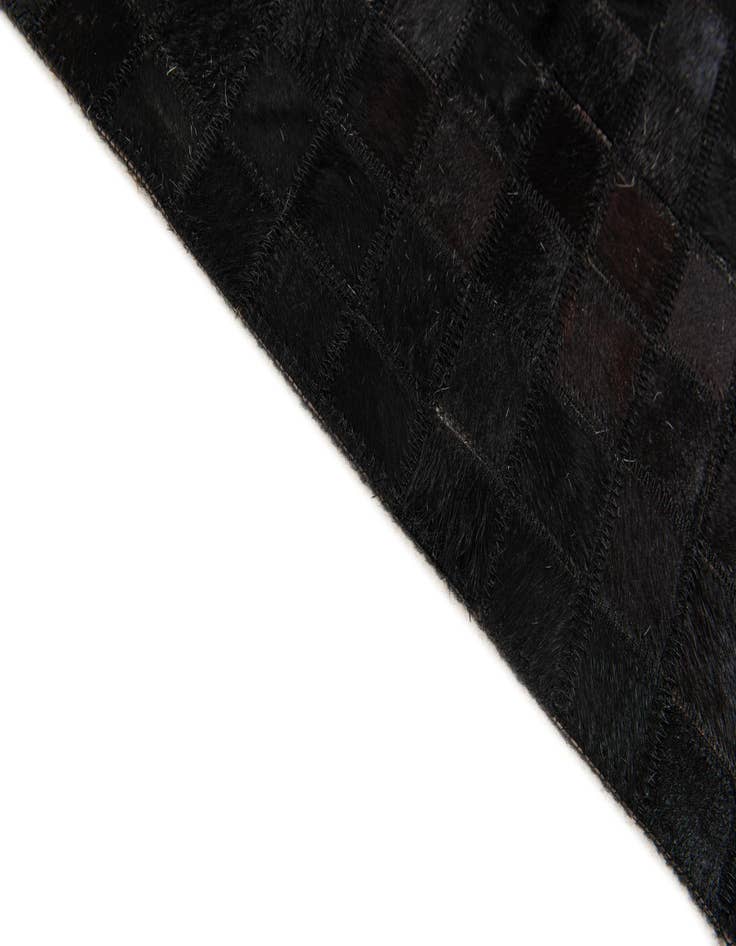 Detail image of 5' 1 x 8' 1 Cowhide Stocks Rug