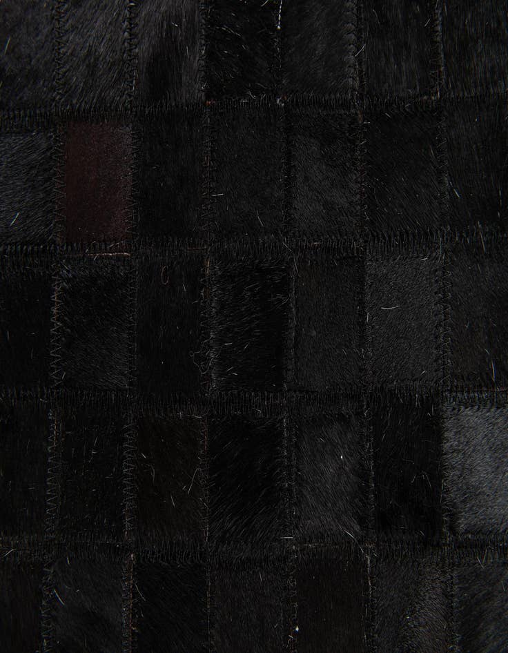 Detail image of 5' 1 x 8' 1 Cowhide Stocks Rug