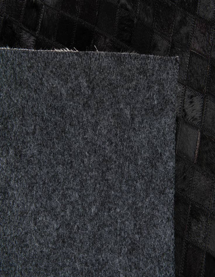 Detail image of 5' 1 x 8' 1 Cowhide Stocks Rug