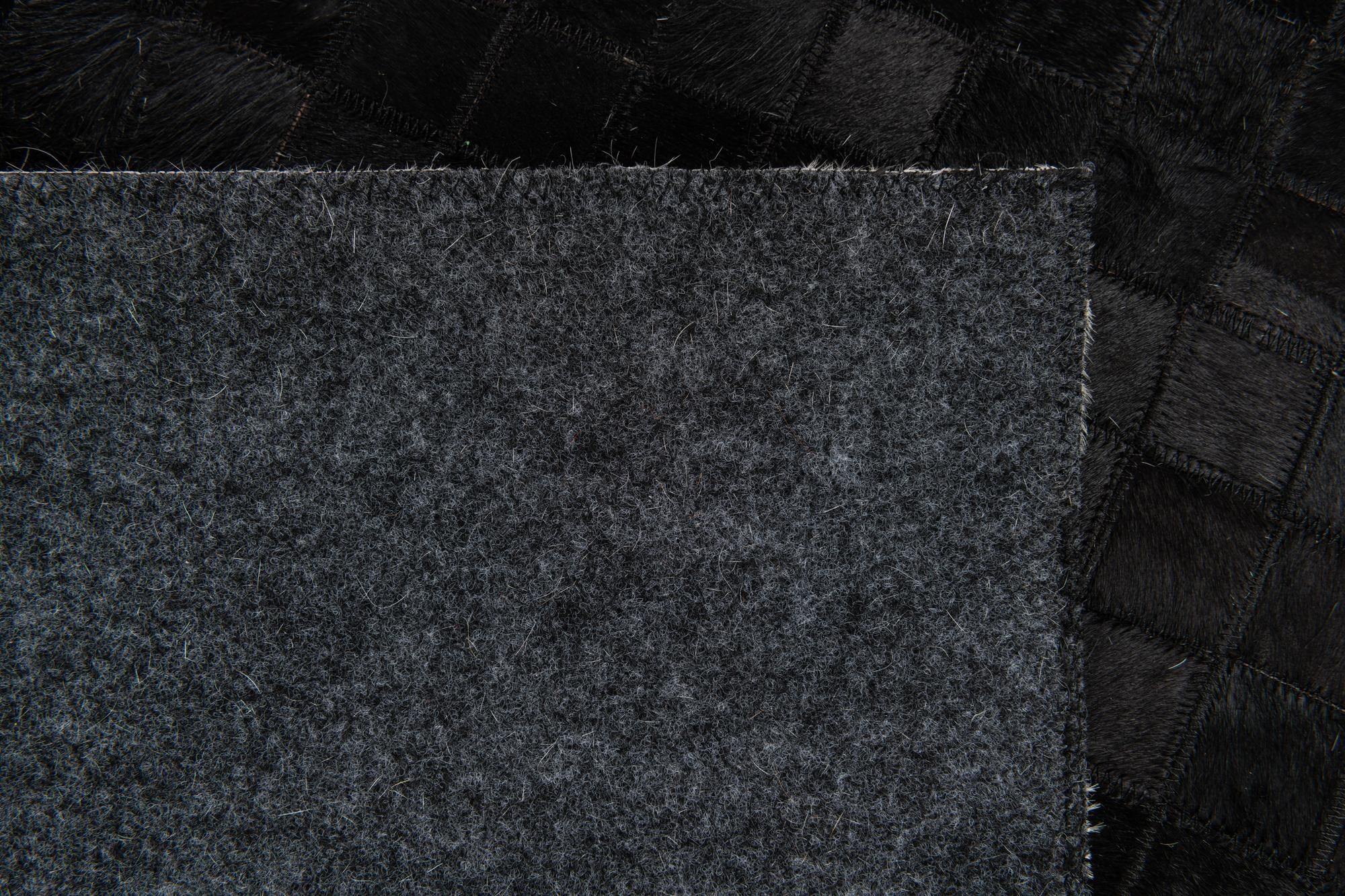 5' x 8' Cowhide Stocks Rug