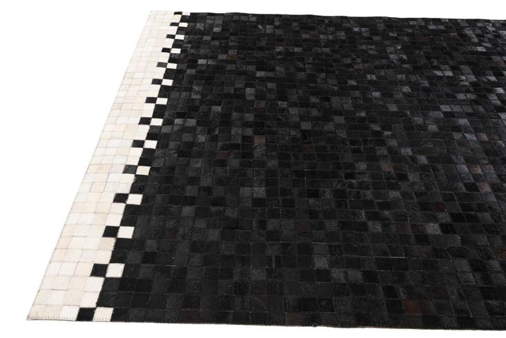 Detail image of 5' x 7' 11 Cowhide Stocks Rug