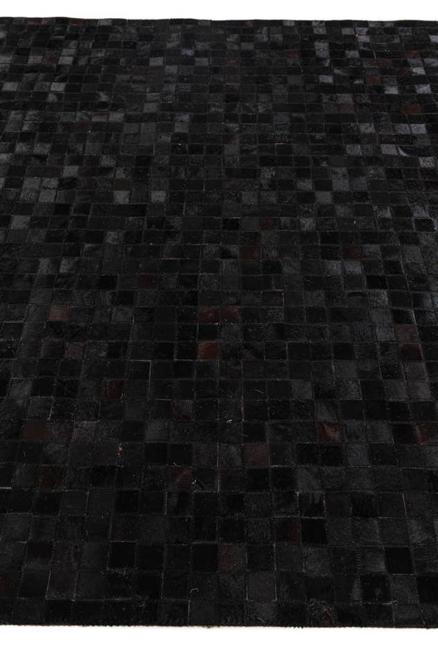Detail image of 5' x 7' 11 Cowhide Stocks Rug