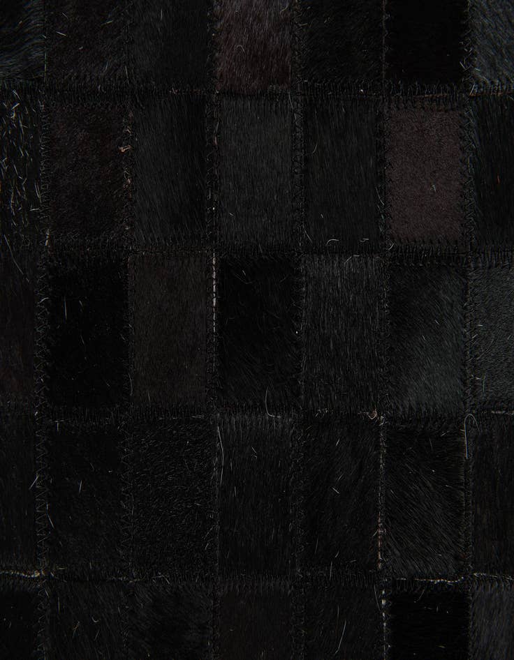 Detail image of 5' x 7' 11 Cowhide Stocks Rug