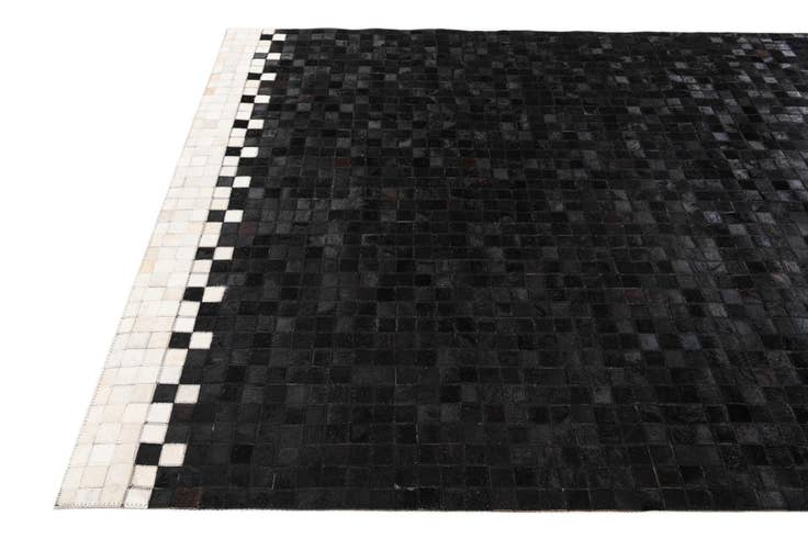 Detail image of 5' x 7' 11 Cowhide Stocks Rug