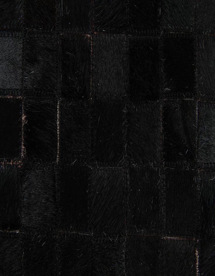 Detail image of 5' x 7' 11 Cowhide Stocks Rug