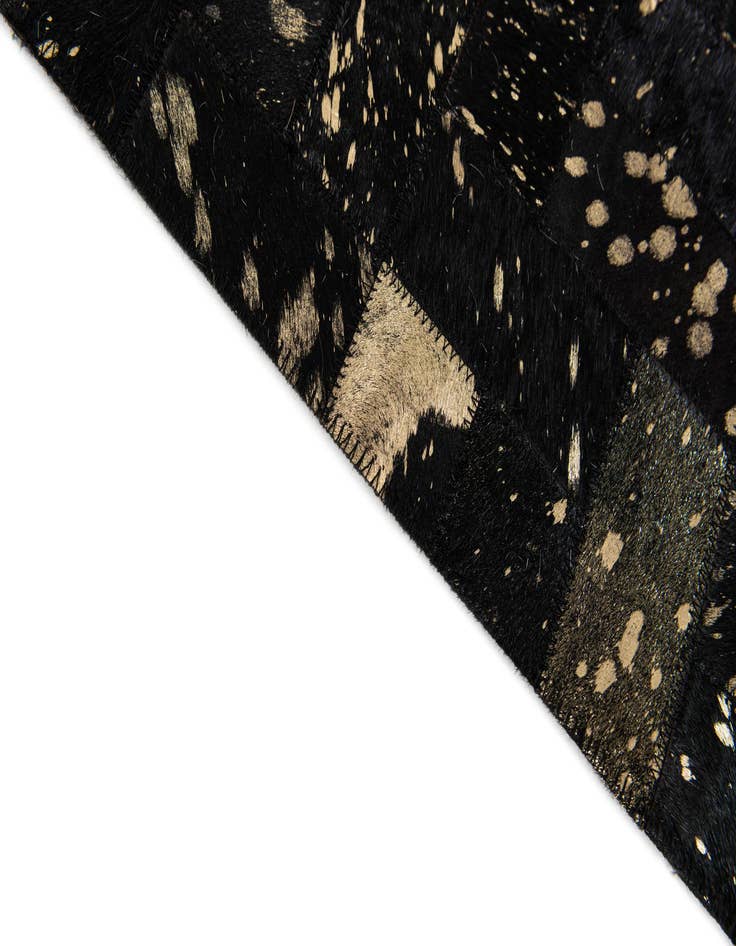 Detail image of 5' x 7' 11 Cowhide Stocks Rug