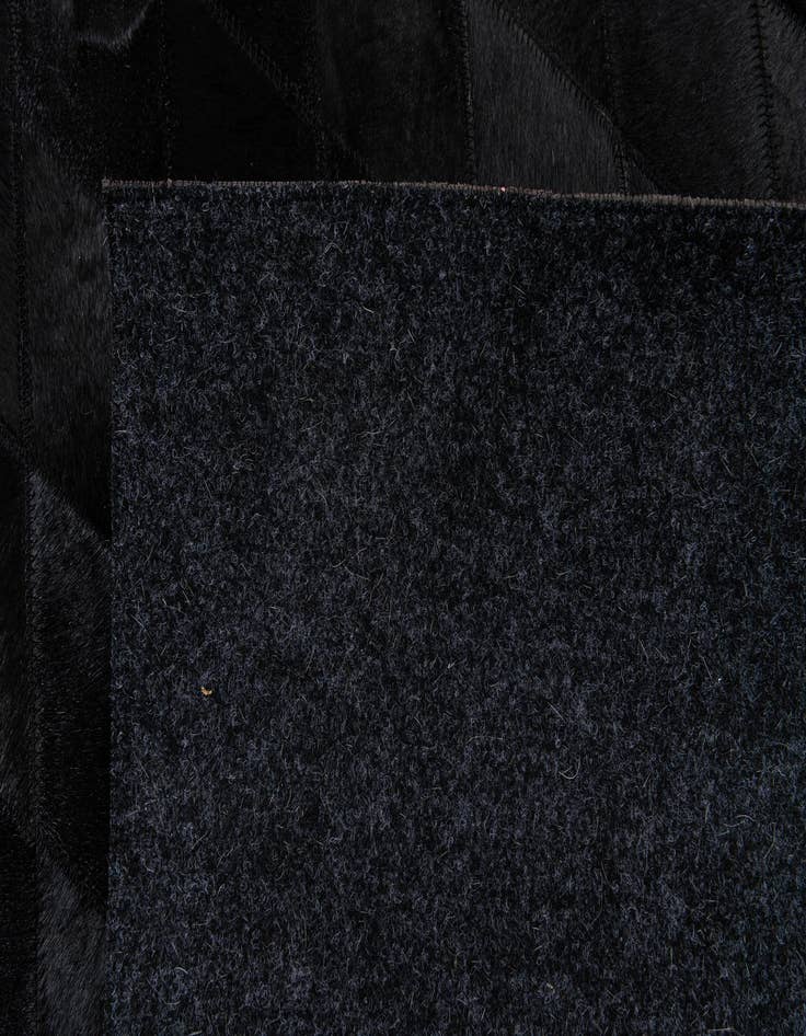 Detail image of 6' 6 x 9' 10 Cowhide Stocks Rug