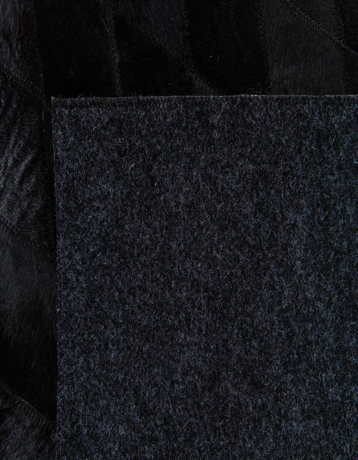 Detail image of 6' 5 x 9' 8 Cowhide Stocks Rug