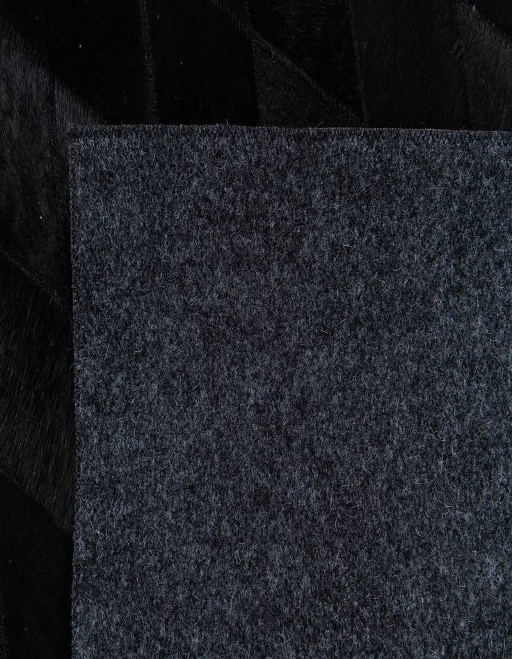 Detail image of 6' 6 x 9' 8 Cowhide Stocks Rug