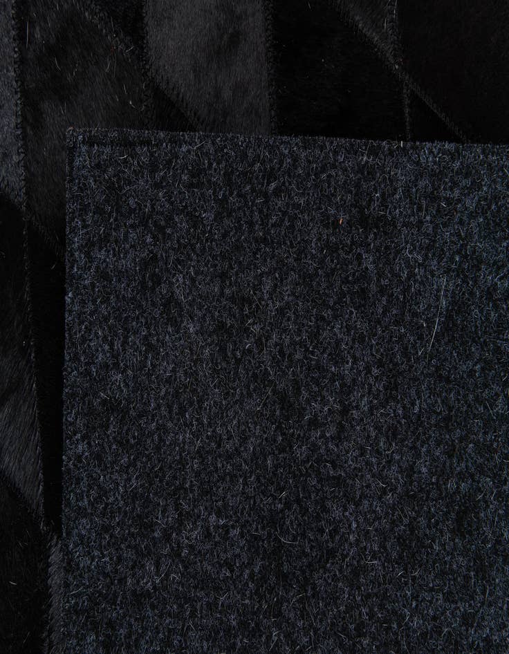 Detail image of 6' 5 x 9' 9 Cowhide Stocks Rug