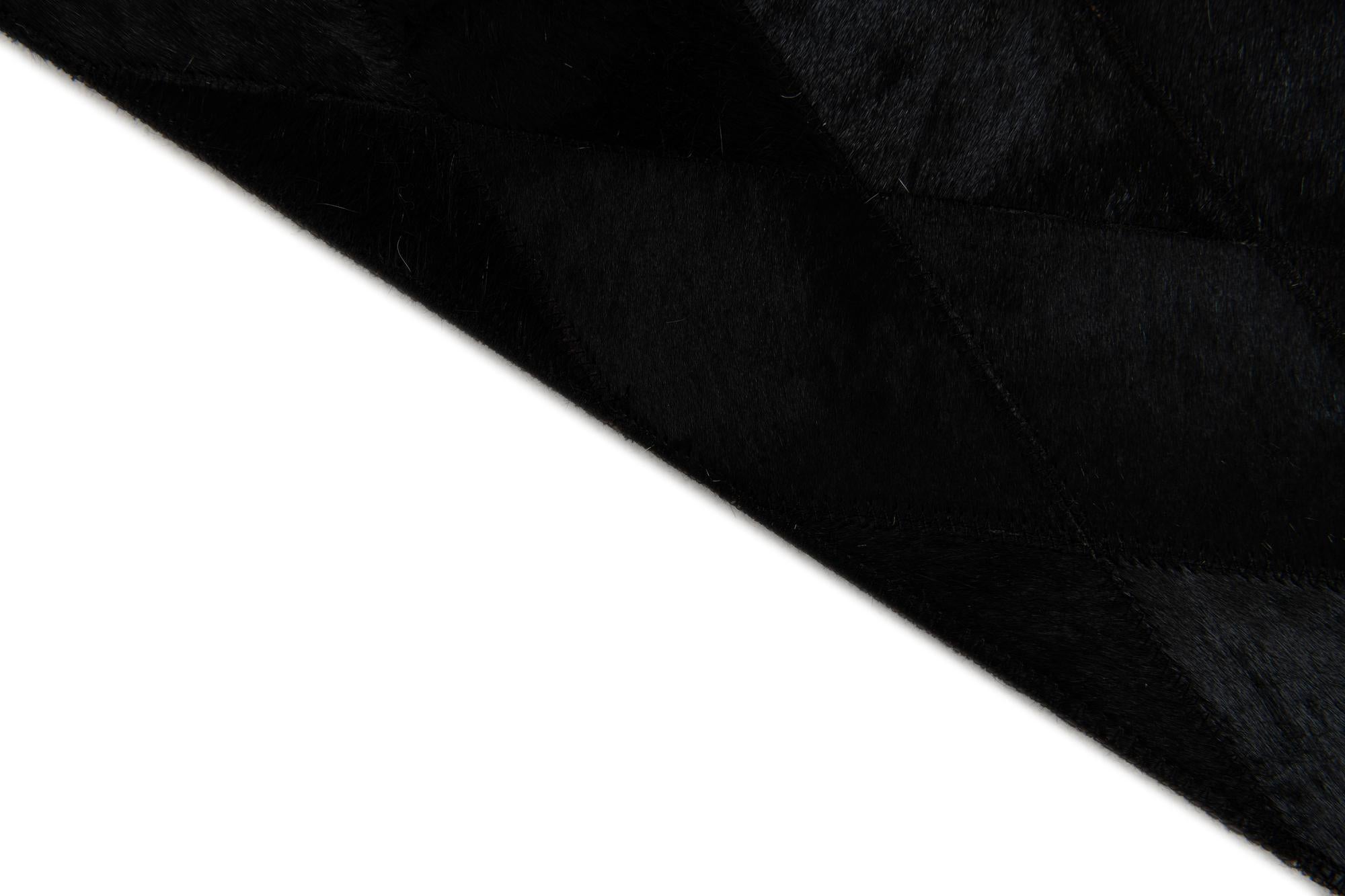 4' 7 x 6' 6 Cowhide Stocks Rug