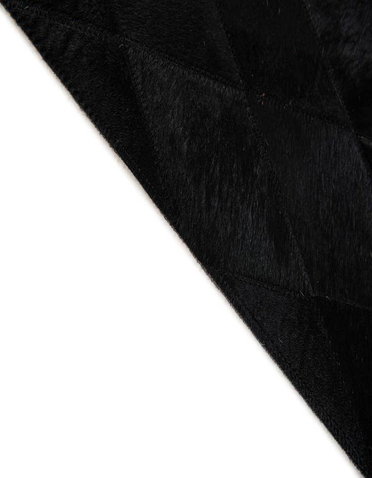 Detail image of 4' 7 x 6' 5 Cowhide Stocks Rug