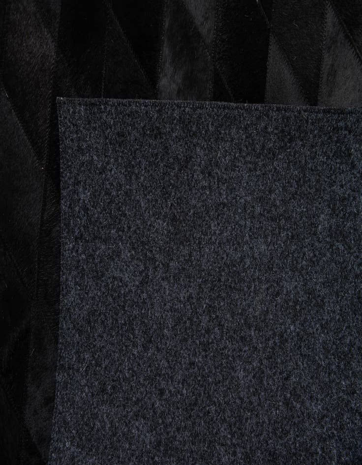 Detail image of 4' 7 x 6' 8 Cowhide Stocks Rug