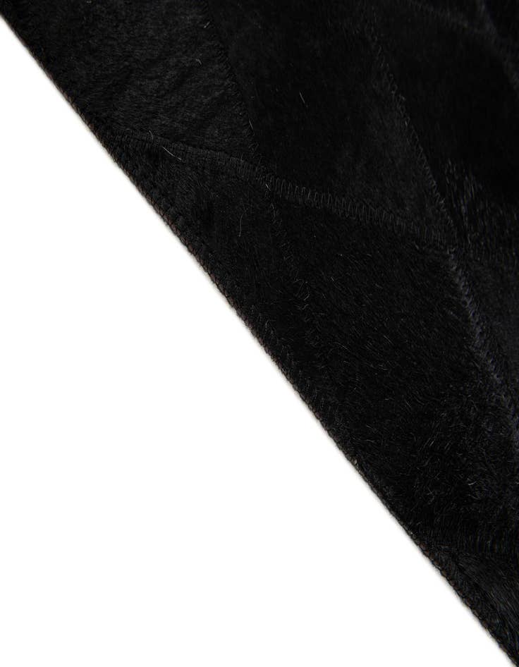 Detail image of 4' 7 x 6' 6 Cowhide Stocks Rug