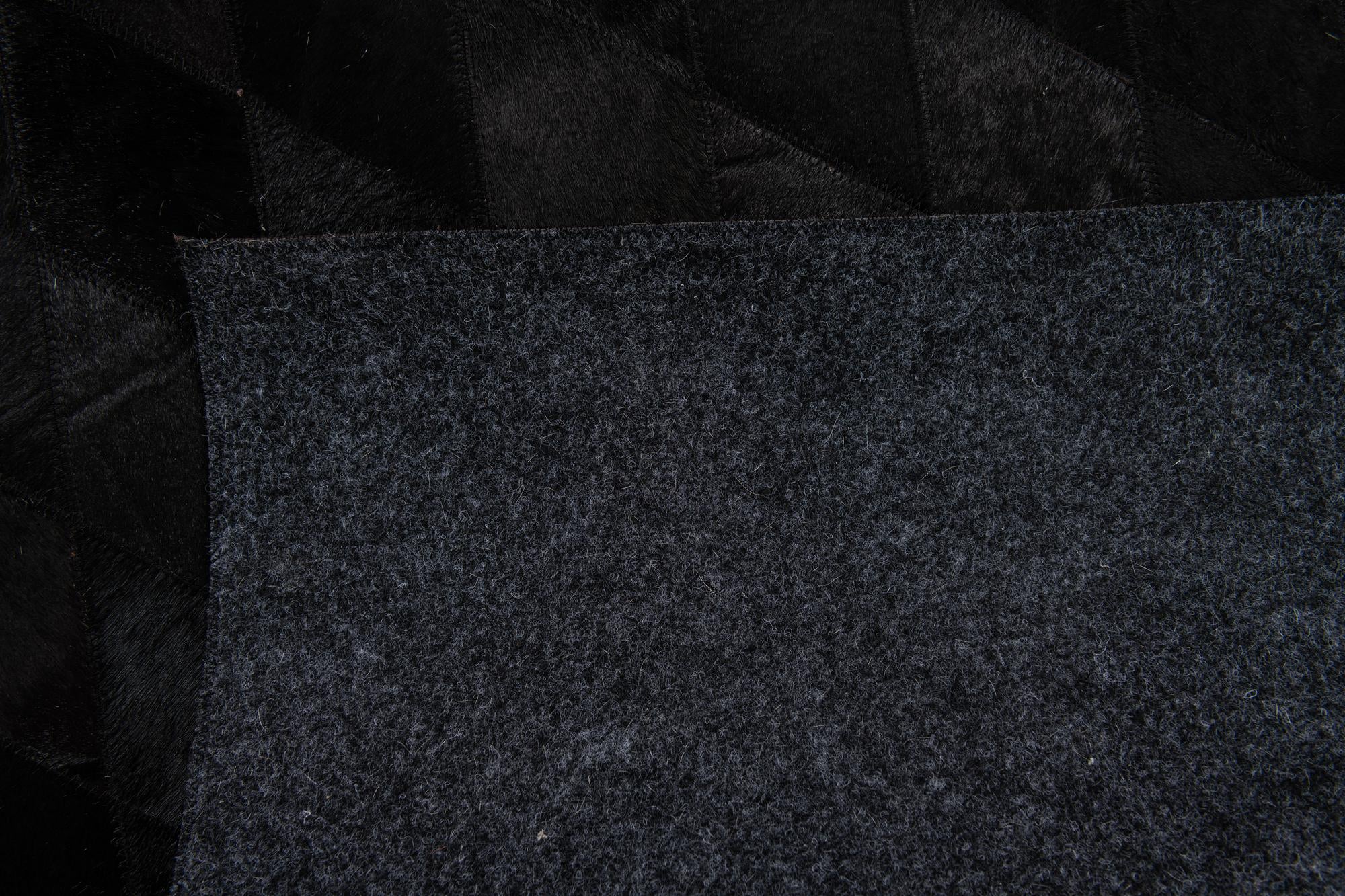 4' 7 x 6' 6 Cowhide Stocks Rug