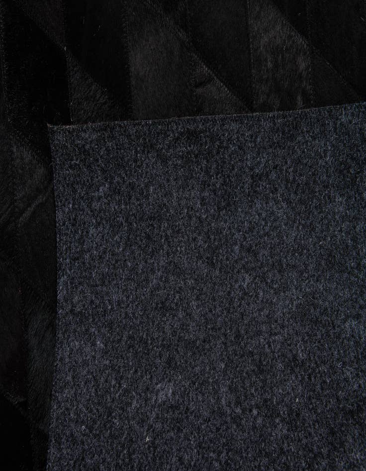 Detail image of 4' 7 x 6' 6 Cowhide Stocks Rug