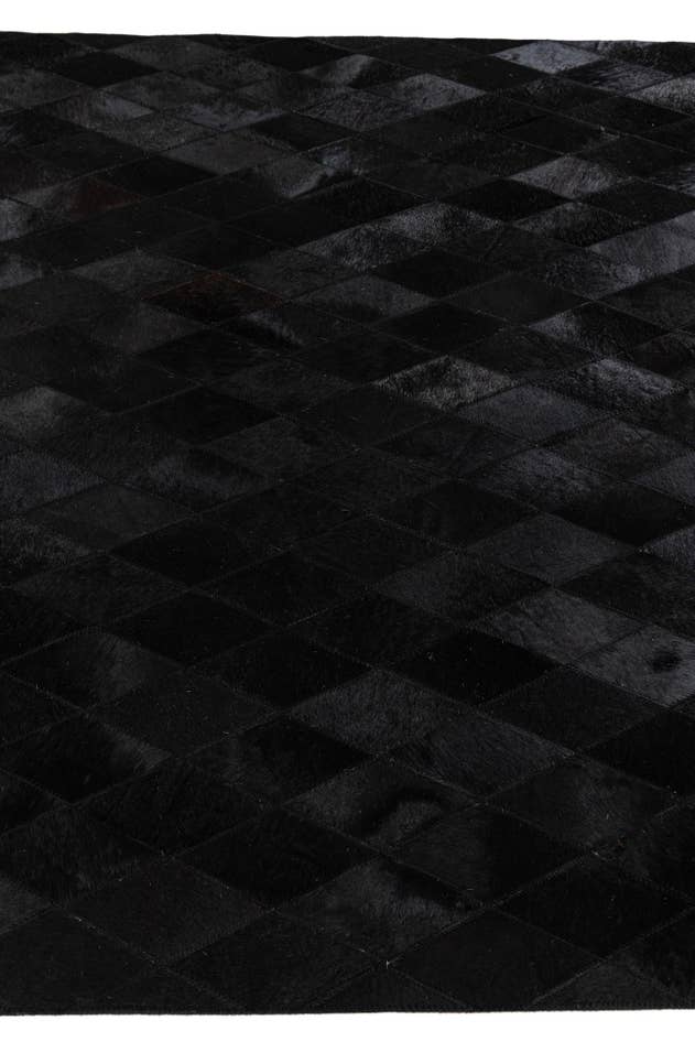Detail image of 4' 7 x 6' 6 Cowhide Stocks Rug