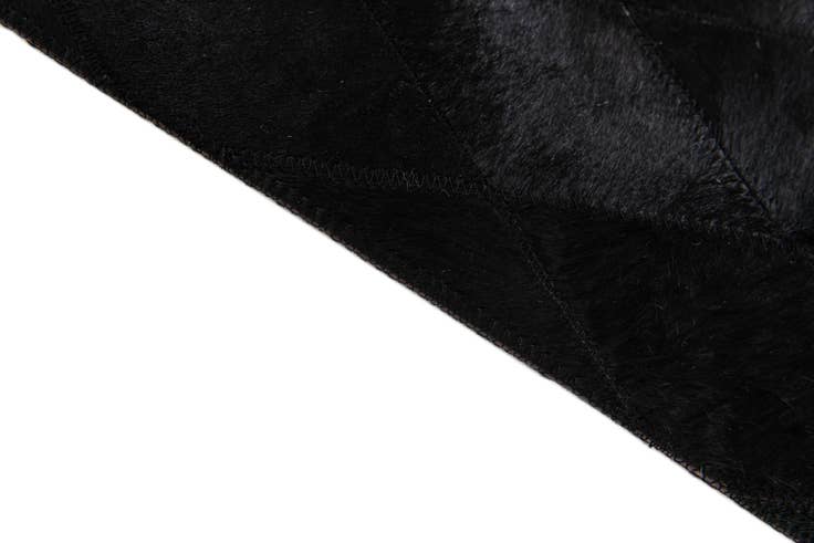 Detail image of 4' 7 x 6' 6 Cowhide Stocks Rug