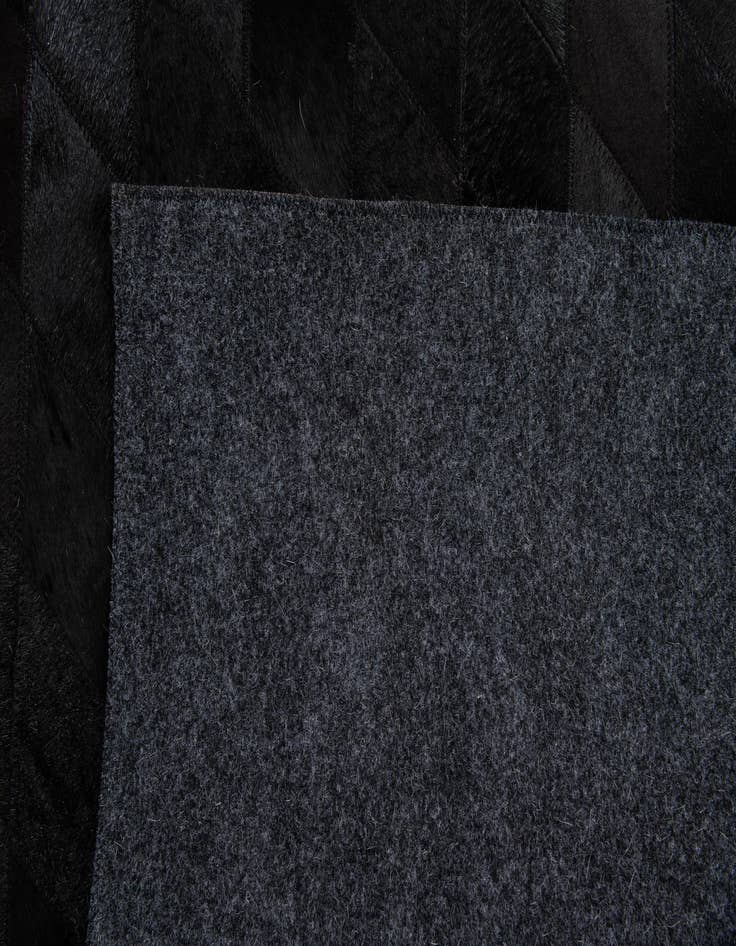 Detail image of 4' x 5' 10 Cowhide Stocks Rug